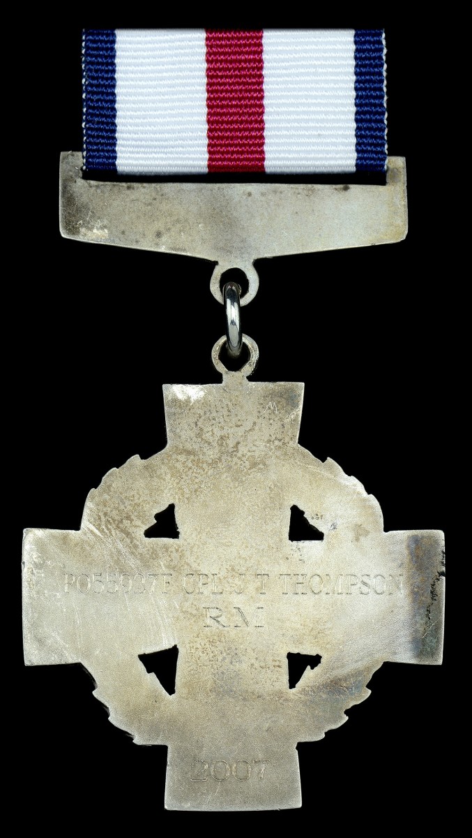 Reverse of the Thompson's C.G.C. showing the 2007-dated engraving.