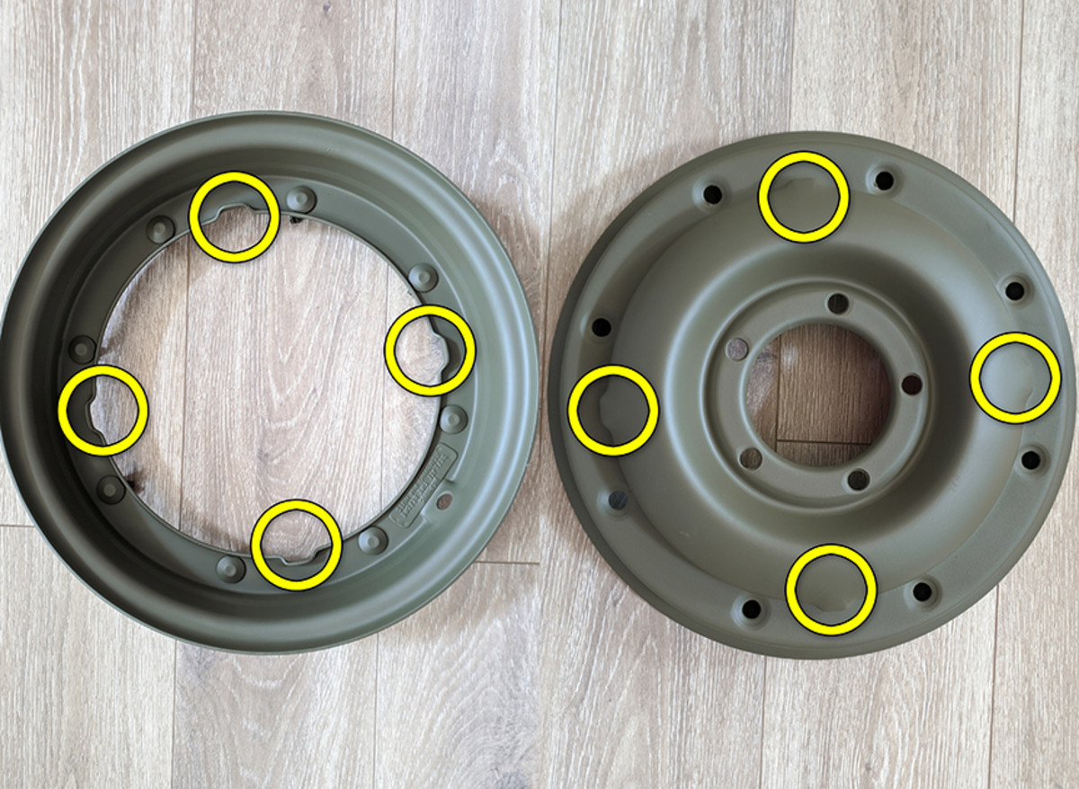Place the outer side of the Combat Rim (the bolt side with the valve hole) onto the tire. When putting the Combat Rim sides together, be careful to make sure the four tabs on the inside (bolt hole) half are aligned with the four notches on the outside (bolt) half.