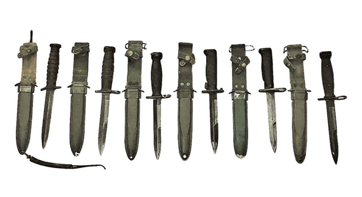 Row of M8 scabbards with various knives and bayonets