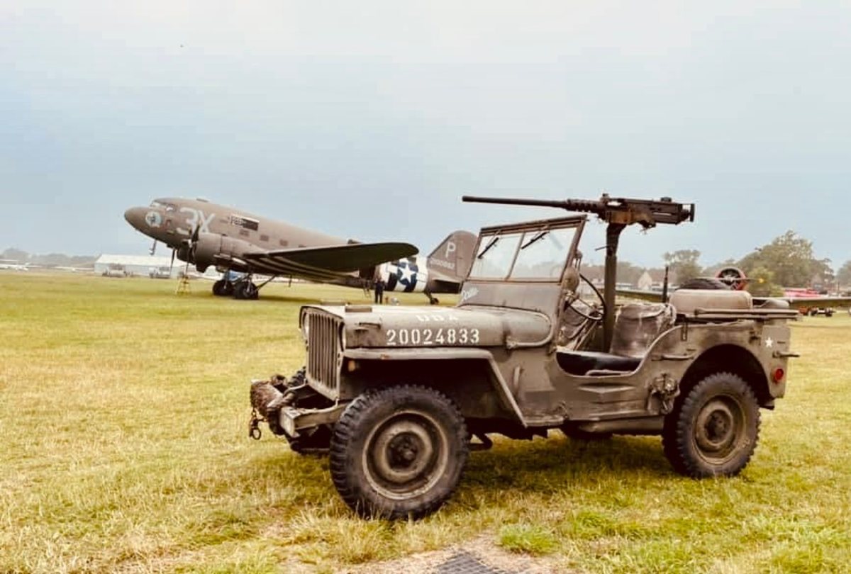 MB jeep in front of a C-47 with D-Day markings
