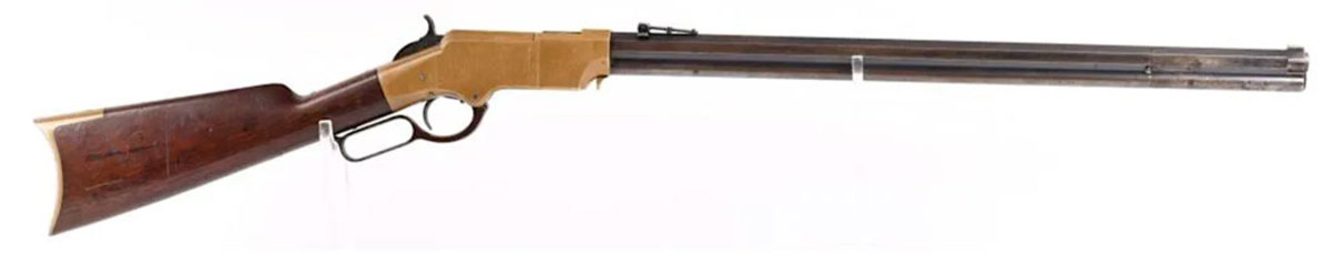 Fine Civil War 2nd Model Martial Henry rifle manufactured in 1865. Barrel shows late large 2-line barrel address with serial number stamped behind rear sight.