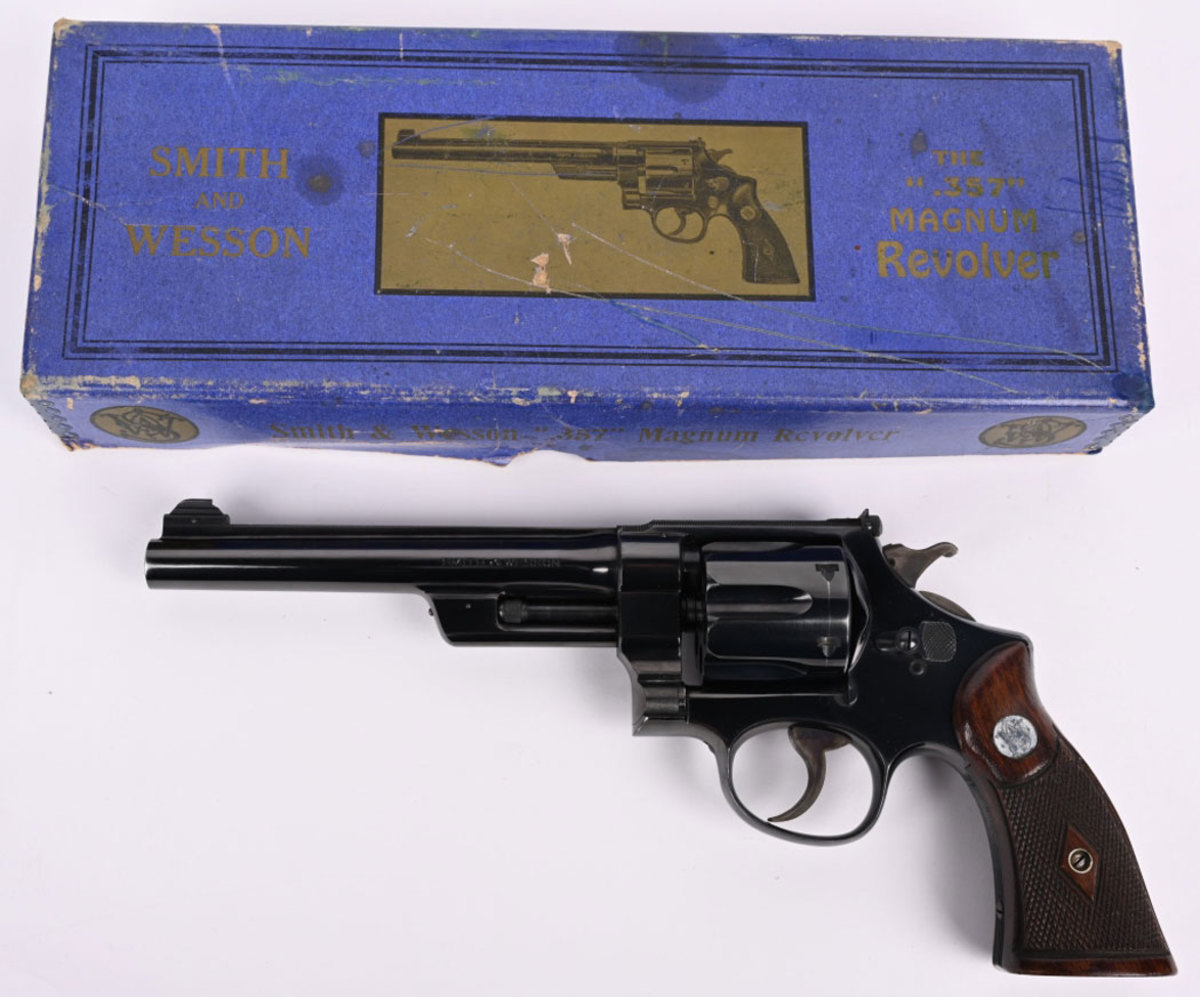 Unfired Smith & Wesson-registered .357 Magnum with registration number 3320, serial number 54926. Comes with blue two-piece picture box which has a sticker with matching serial number and registration.