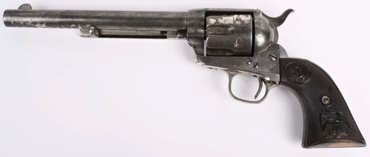 Colt 1885 etched-panel SAA nickel revolver, 44-40 caliber. Known as the classic cowboy gun, it is etched ‘Colt Frontier Six Shooter’ on the left side of the barrel. Clean, untouched, and with all matching numbers, it sold above estimate for $9,900.