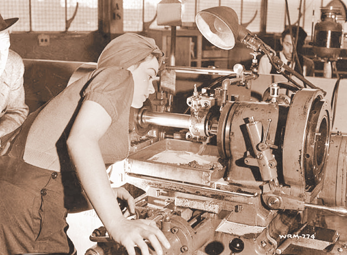 While not as glamorous as the official Bren Gun Girl photo, this one showed Foster working the line at the Inglis Company plant in Toronto in May 1941.