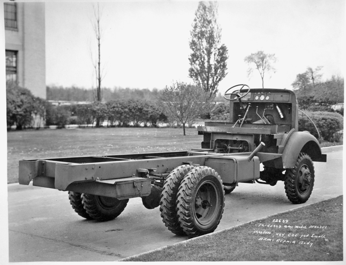 Two bumperettes and no tow pintle are on the rear of the chassis frame. Under the rear of the chassis frame is a toolbox, the door of which is on the right side. The fuel filler neck is long and angled to position the filler cap a foot or so from the bottom of the body. The 30-gallon fuel tank rests in a pan, with two metal straps to secure it in place.