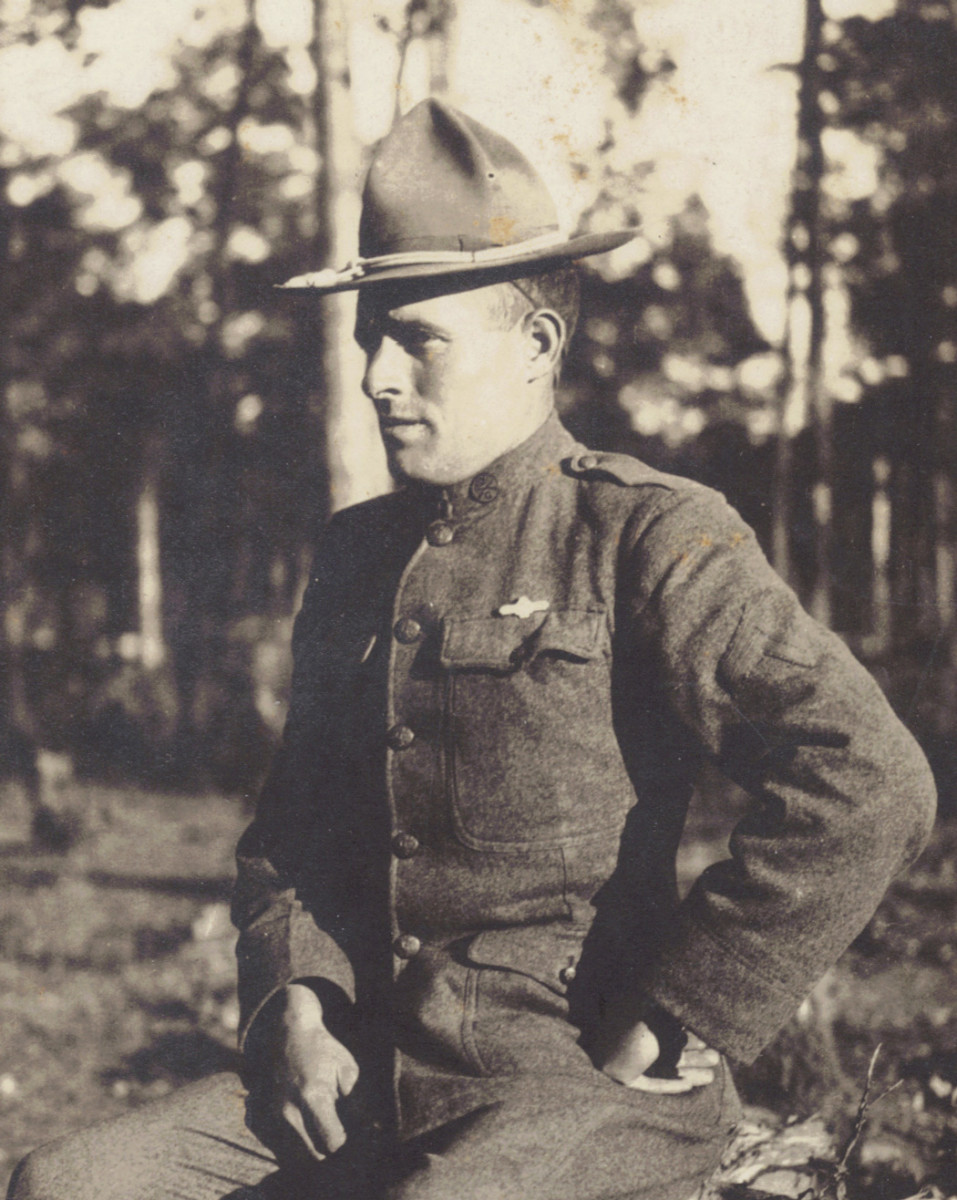 Under magnification, the collar disk shows this un-named soldier to be serving in Company G, 2nd Infantry Regiment/19th Division at Camp  Dodge, Iowa.