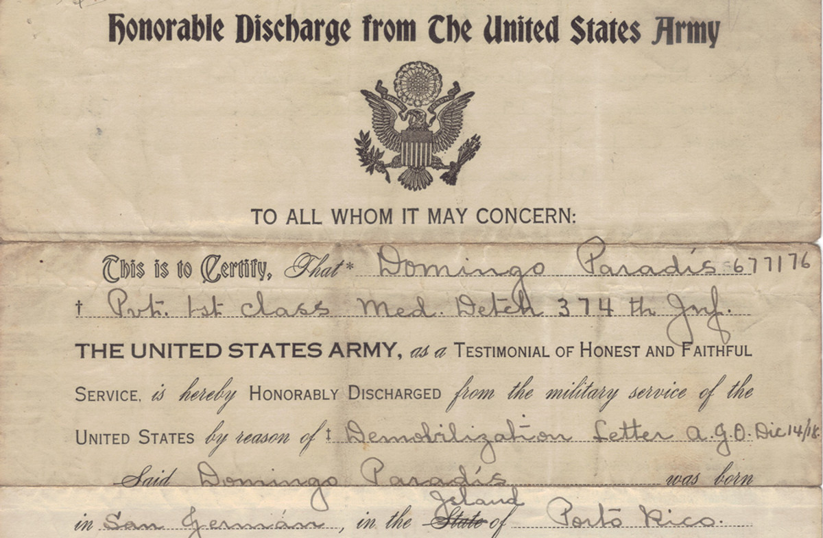 A truly unique document; the Honorable Discharge for PFC Domingo Paradis assigned to the 374th Infantry Regiment/94th Division at Camp Las Casas, Puerto Rico. The 94th was originally planned to be comprised of drafted men from Puerto Rico.