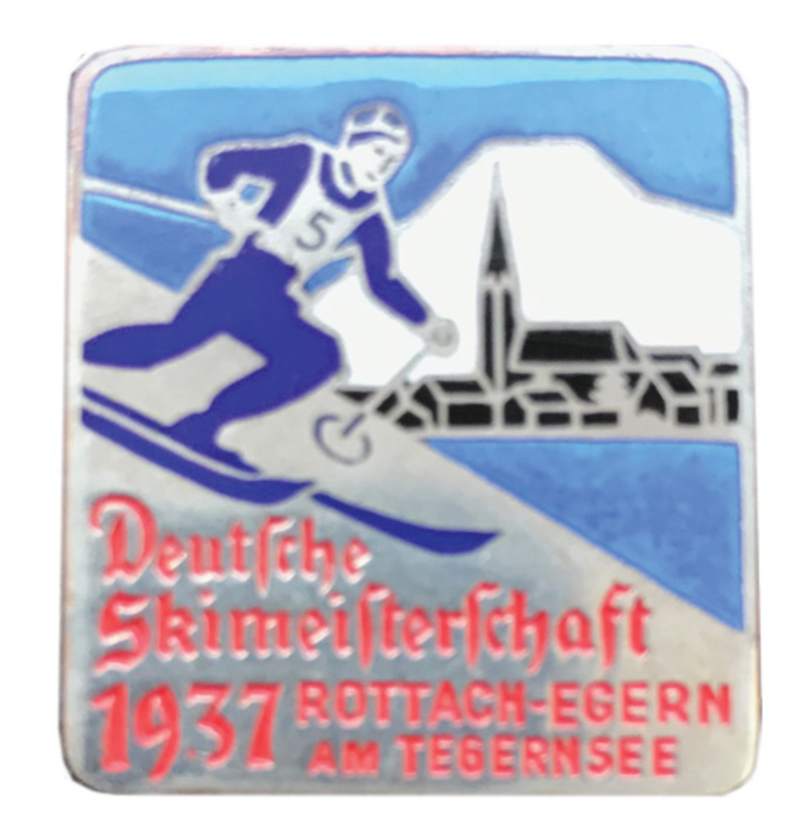 A 1937 German Ski Championship Badge for an event held February 18-22, 1937, in Rottach-Egern am Tegernsee, Germany. This badge is constructed of silvered bronze with enamel features and displays a downhill skier with the village of Rottach-Egern in the background. The badge is approximately 30 X 30 mm with a horizontal pin on the reverse. These badges are scarce costing about $100.