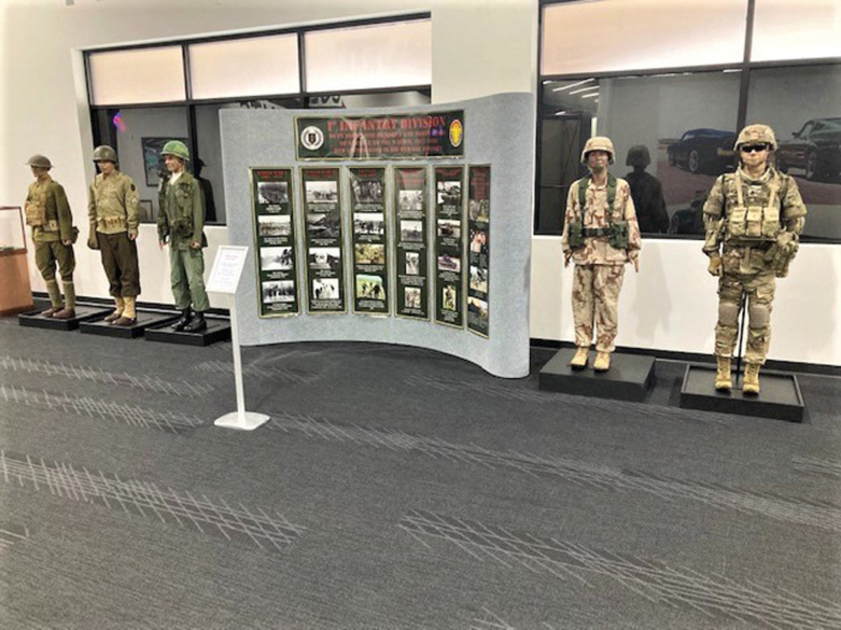 Ft. Riley generously loaned their 1st Infantry traveling display complete with photos, memorabilia, and period uniforms. 