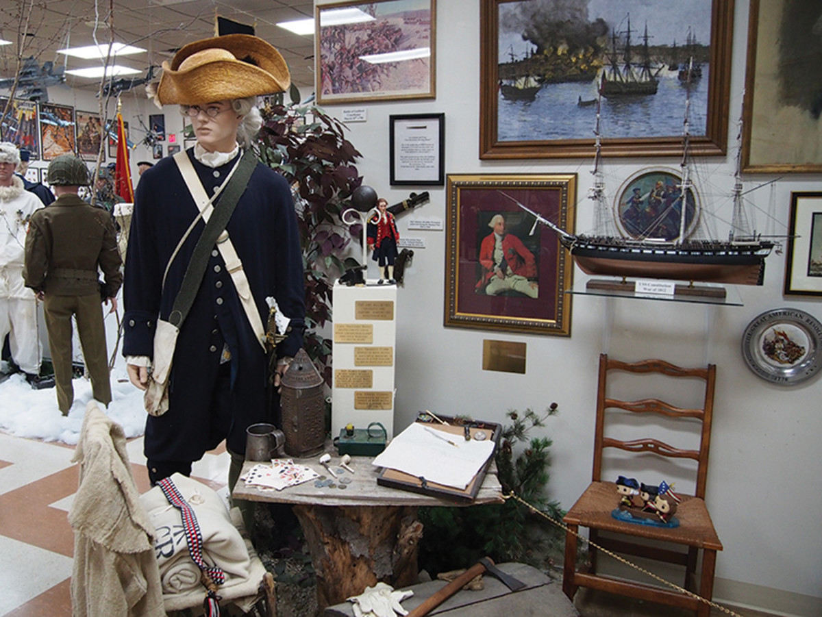 The Revolutionary War uniform is a reproduction; however the display is quite authentic with ephemera of the day plus artwork rendering the scenes.