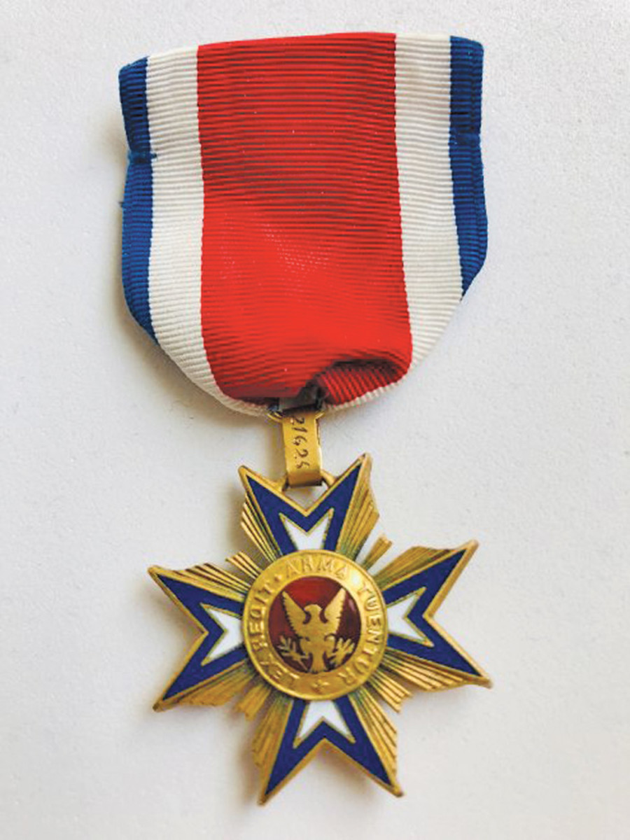The red center striped ribbon on the Mollus Medal was first issued to hereditary members with this medal numbered #21635.