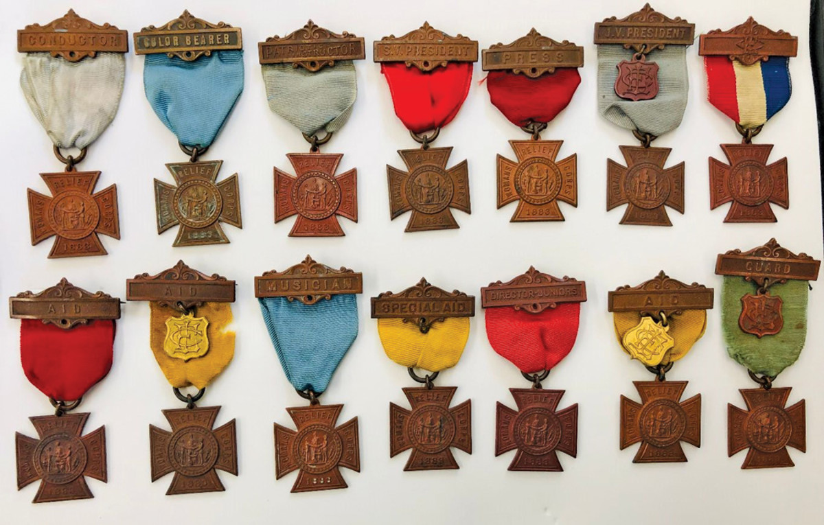 This Women’s Relief Corps collection exhibits a rainbow of ribbon colors and unique brooches.