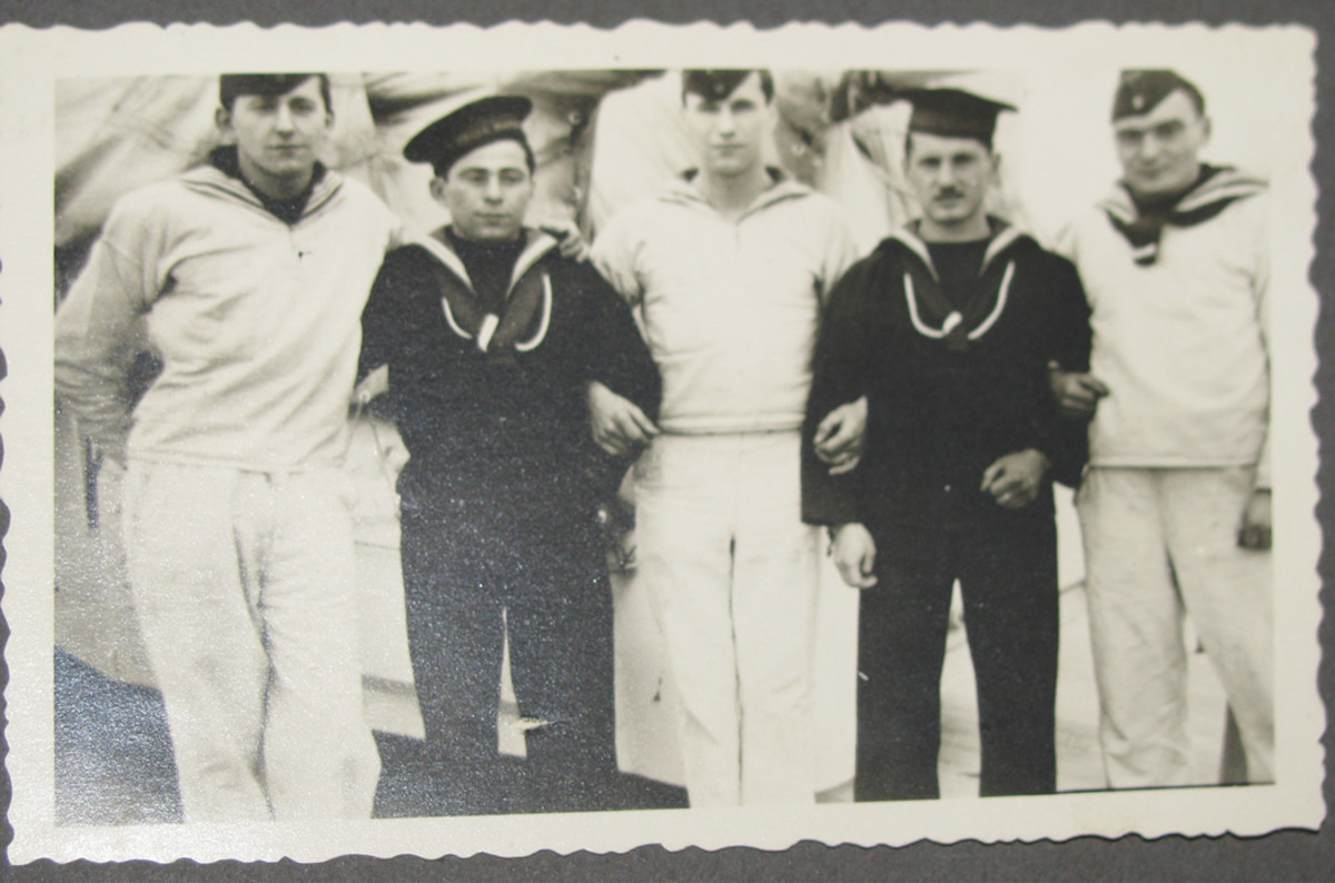Prewar travels included visiting other countries and seeing foreign navies. The album’s owner stands at left with his comrades and two Italian sailors.
