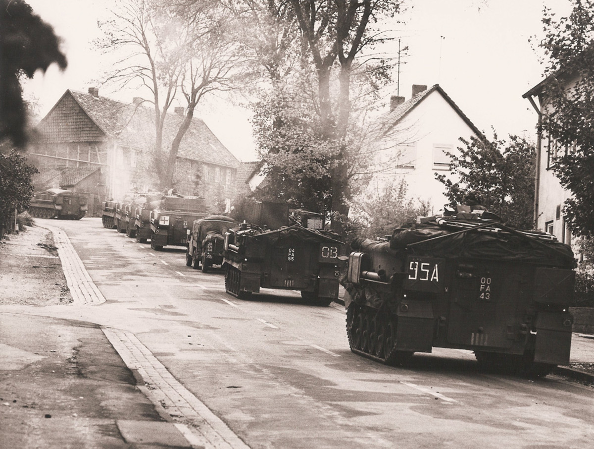A column of FV432s on exercise in West Germany, including a Command Vehicle version and an ambulance version.