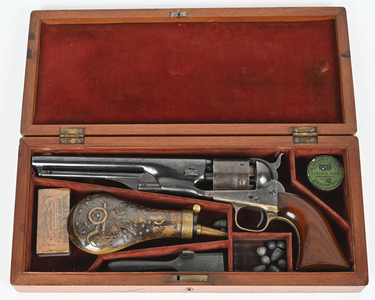 Colt Model 1861 Navy Revolver, manufactured 1863, 7½in barrel, caliber .36 percussion. One of fewer than 39,000 produced. Compartmented, velvet-lined case with powder flask, bullet mold, cartridges and tin of percussion caps.