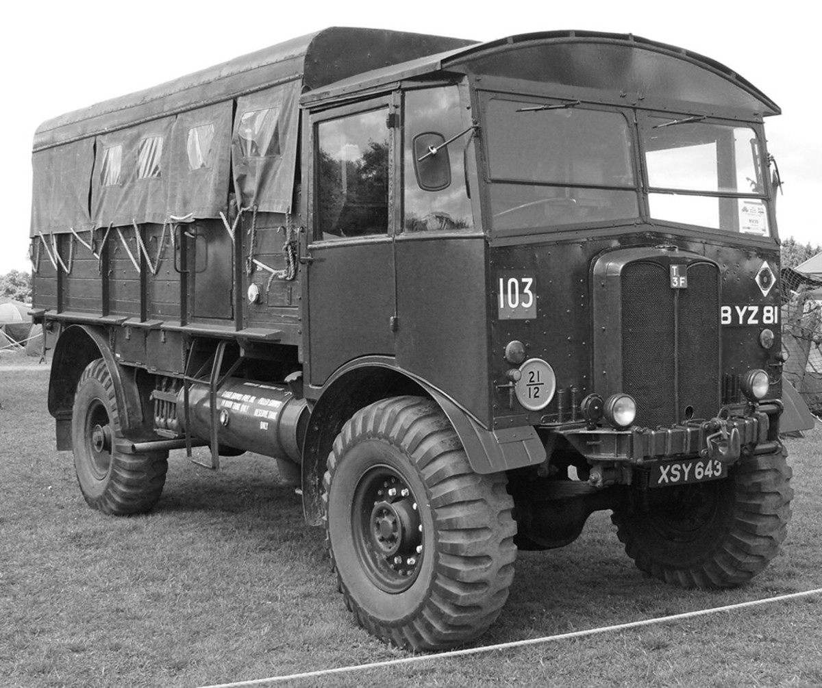 As an artillery tractor, rather than a cargo vehicle, the wooden sides were fixed in place without folding down, but did have a narrow crew door on each side.