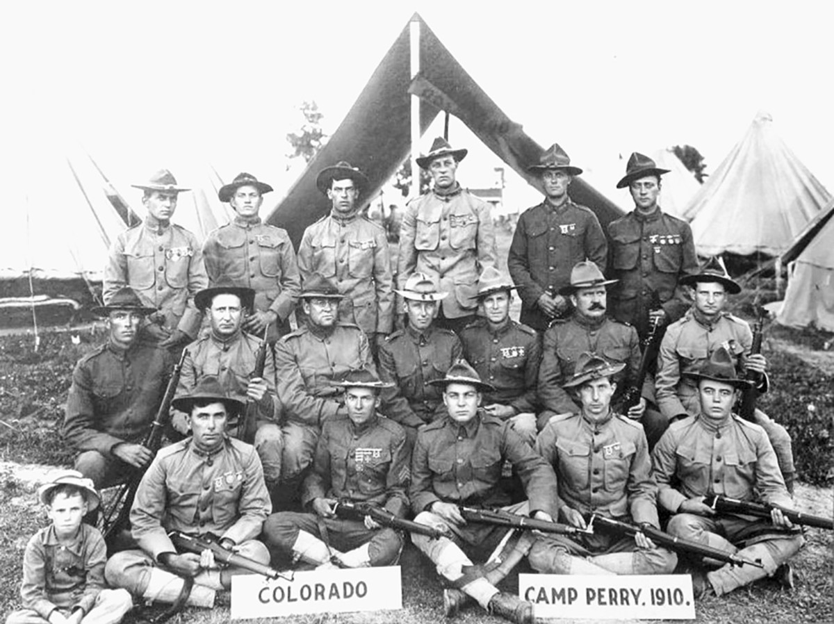 1910 Colorado Rifle Team with Corporal Frank P. Coffin in the first row, second from right wearing both his Expert Rifle and Expert Pistol badges.