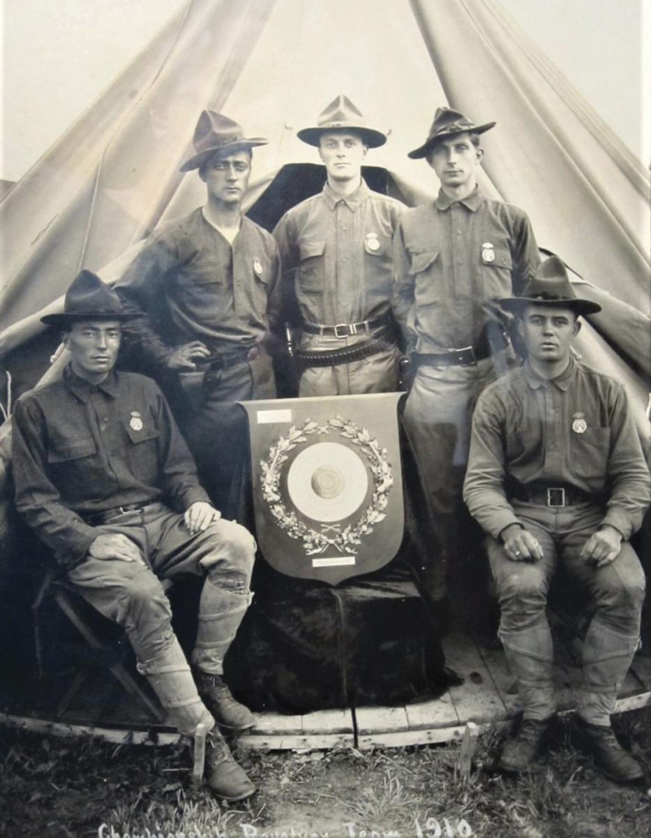 The 1910 Championship Revolver Team with Corporal Coffin standing on the right wearing his NRA Championship Revolver Team Match medal.