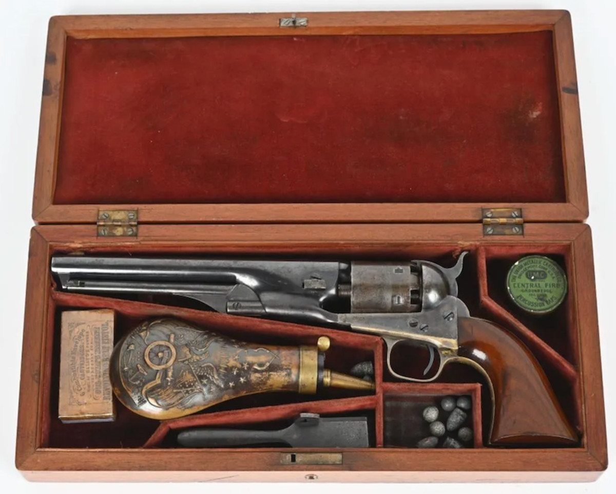 Colt Model 1861 Navy Revolver, manufactured 1863, 7½in barrel, caliber .36 percussion. One of fewer than 39,000 produced. Compartmented, velvet-lined case with powder flask, bullet mold, cartridges and tin of percussion caps. Sold for $18,600 against an estimate of $10,000-$15,000