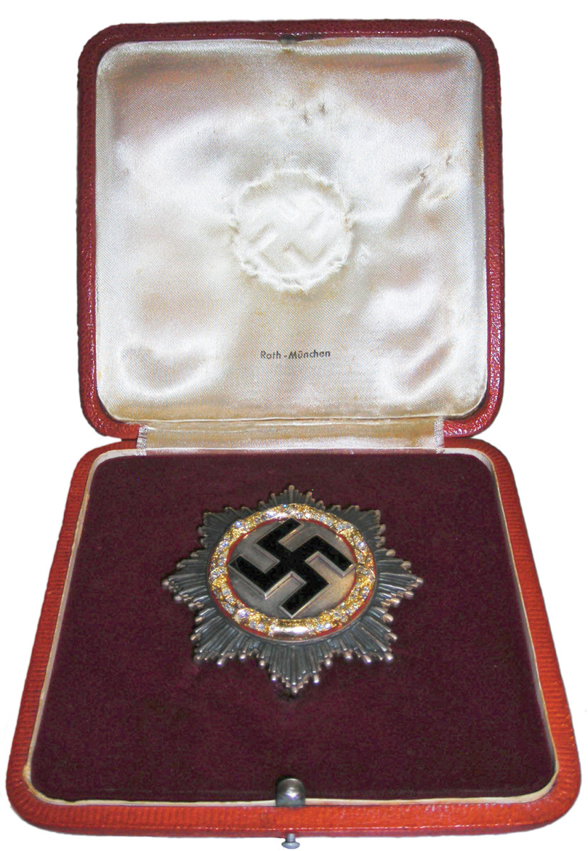 One of the 20 prototype German Crosses in Gold with Diamonds in its original case. These were never awarded. The whereabouts of all 20 are known.