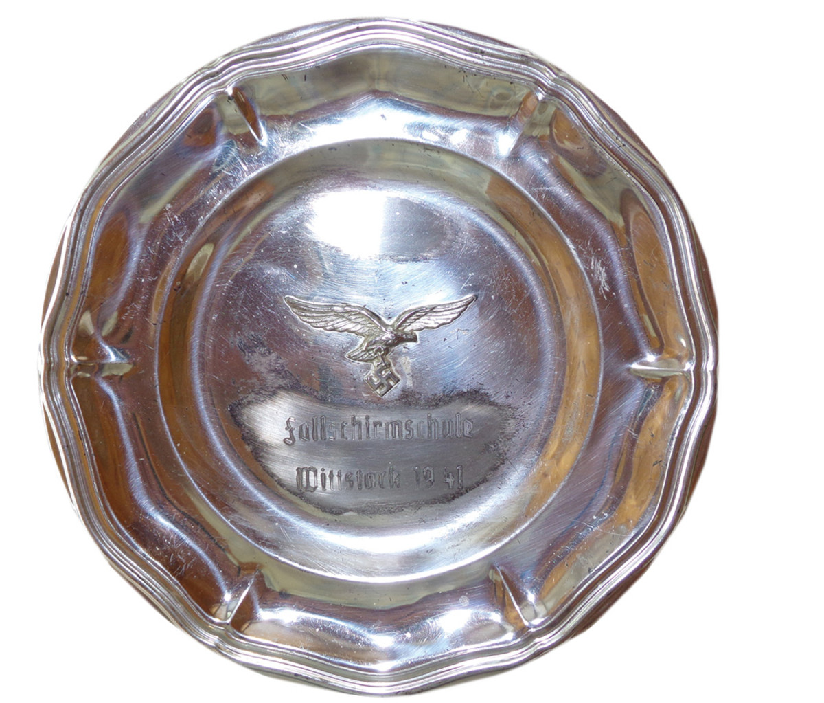 Pride in the service could be seen in mementos such as this silver plate from the paratrooper training school in Wittstock, dated 1941.