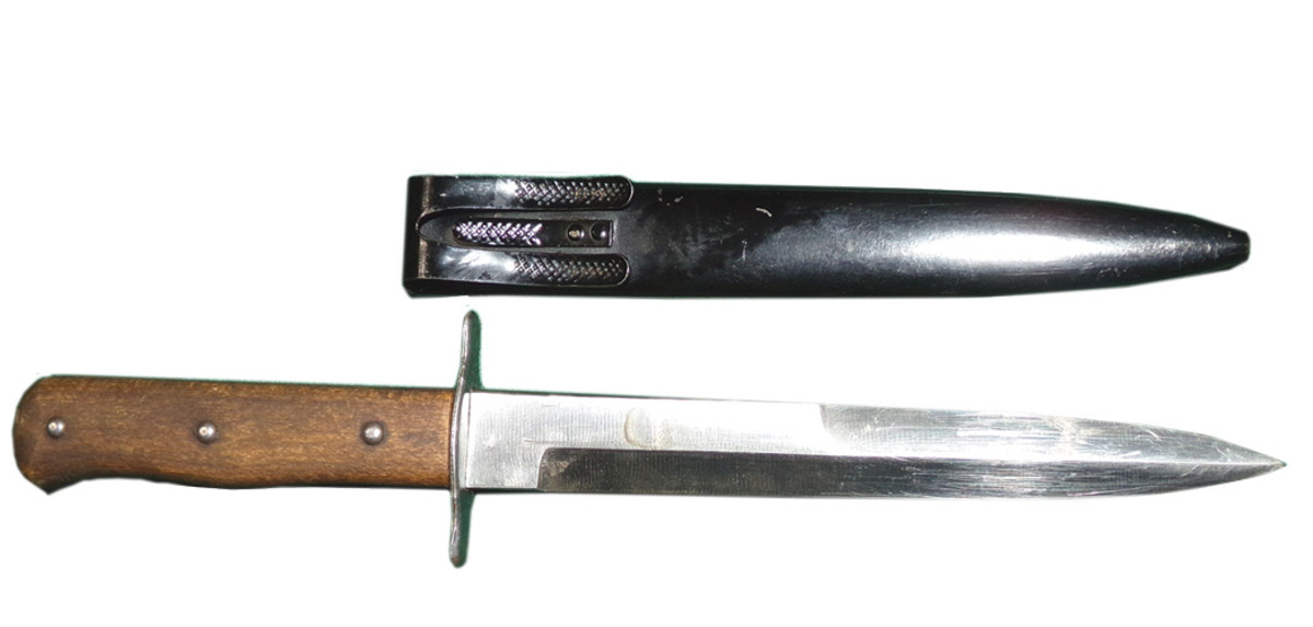 A Luftwaffe boot knife as issued to the ground and air troops of Nazi Germany. Such knives are typically marked with a “5” or “6” under an eagle acceptance mark, though the letters “S” and “W” have been recorded. Still many others had no marks at all. This later version is stamped with a 6 on the ricasso.