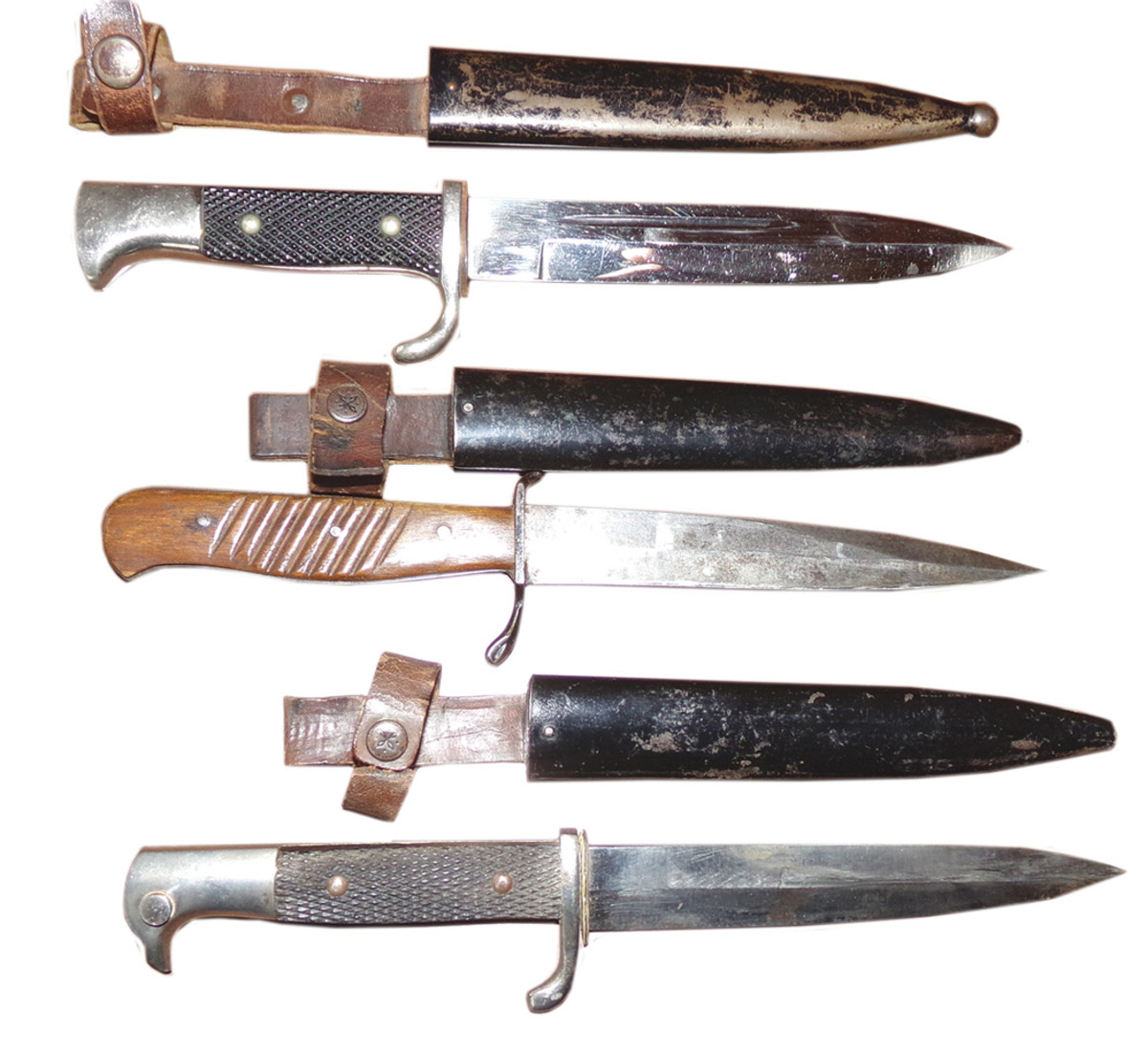 Though used for domestic chores such as eating, cooking and general repairs, the long sharp knives could, as a last resort, be used to kill an enemy soldier in hand-to-hand combat.