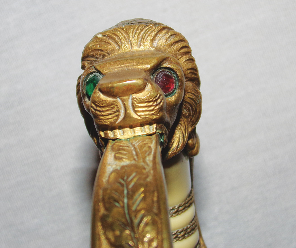 Many lion’s head naval swords had one green and one red glass eye indicating fore and aft.