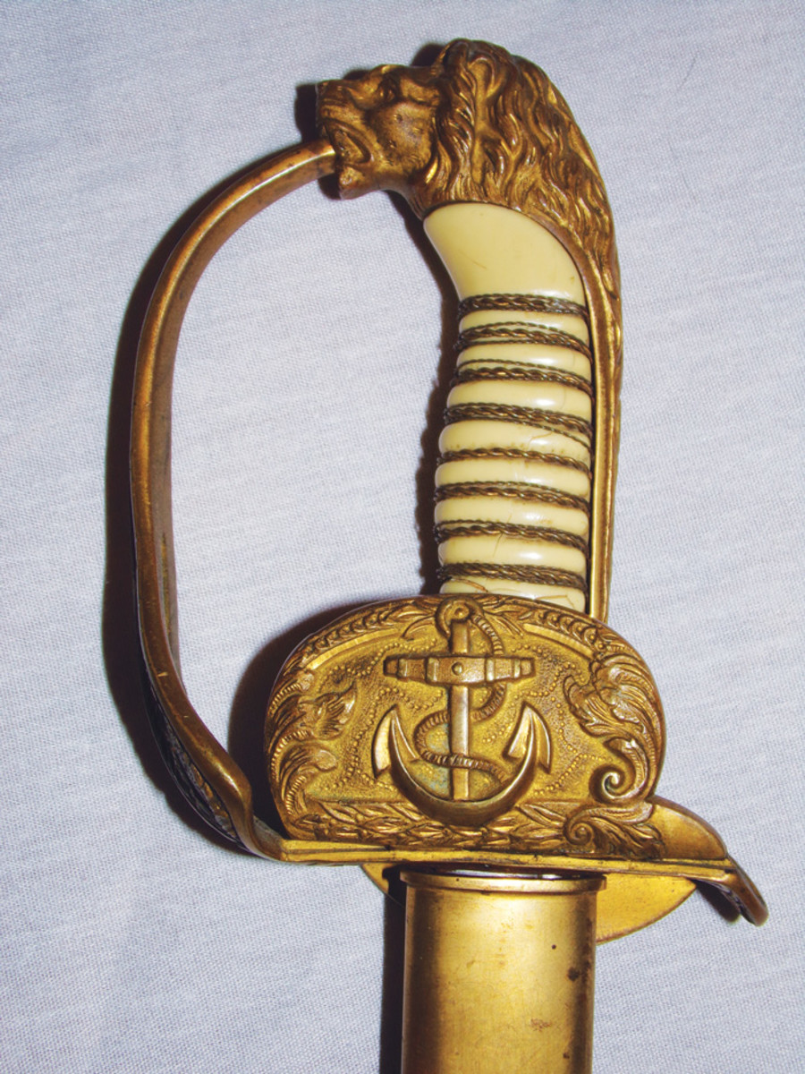 A “depot” naval sword. These were issued to naval officers who did not own swords for special occasions, and remained the property of the navy. 