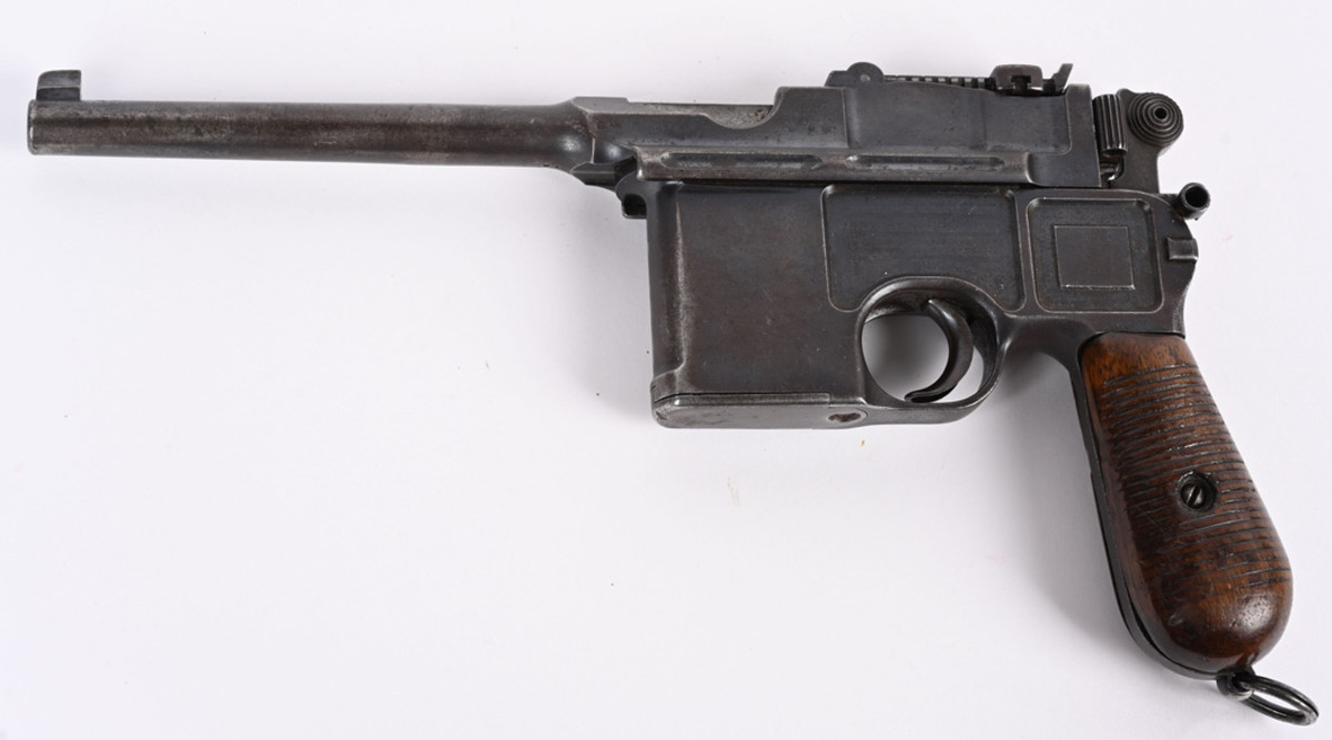 Antique (1897) 7.63-caliber Mauser C96 conehammer broomhandle pistol, 5½in barrel.