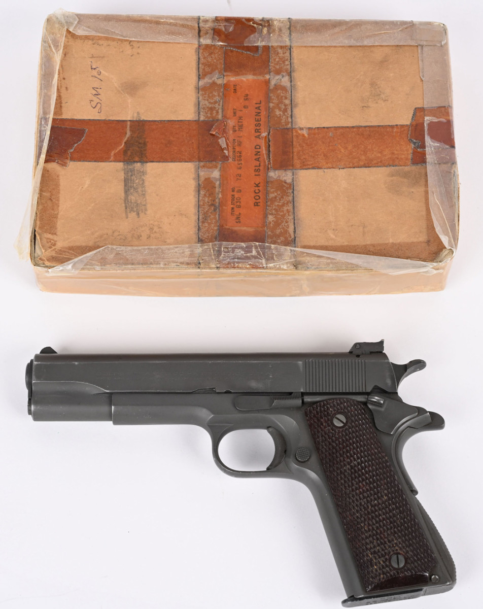 Colt Service Model Ace with two-digit serial number SM15, manufactured 1936 and reputedly from first group of Service Model Ace pistols obtained by U.S. Government for trials and consideration. Retains over 97% Parkerized finish. Comes with Rock Island Arsenal (RIA) shipping box with label and ‘SM15’ scribed on top, plus copy of 1954 RIA sales receipt issued to Capt. Mark Jartman.