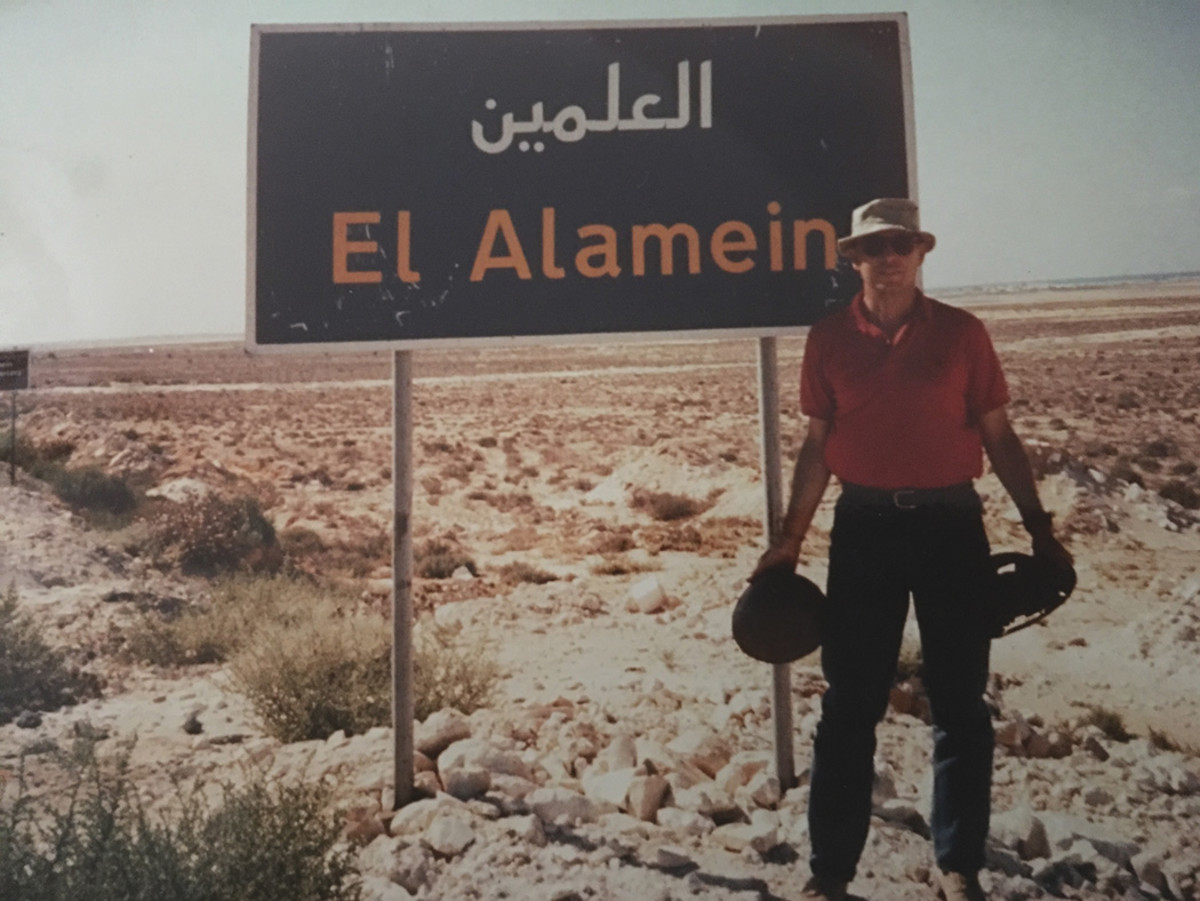The author with helmets found at El Alamein. All items shown here were surface finds.