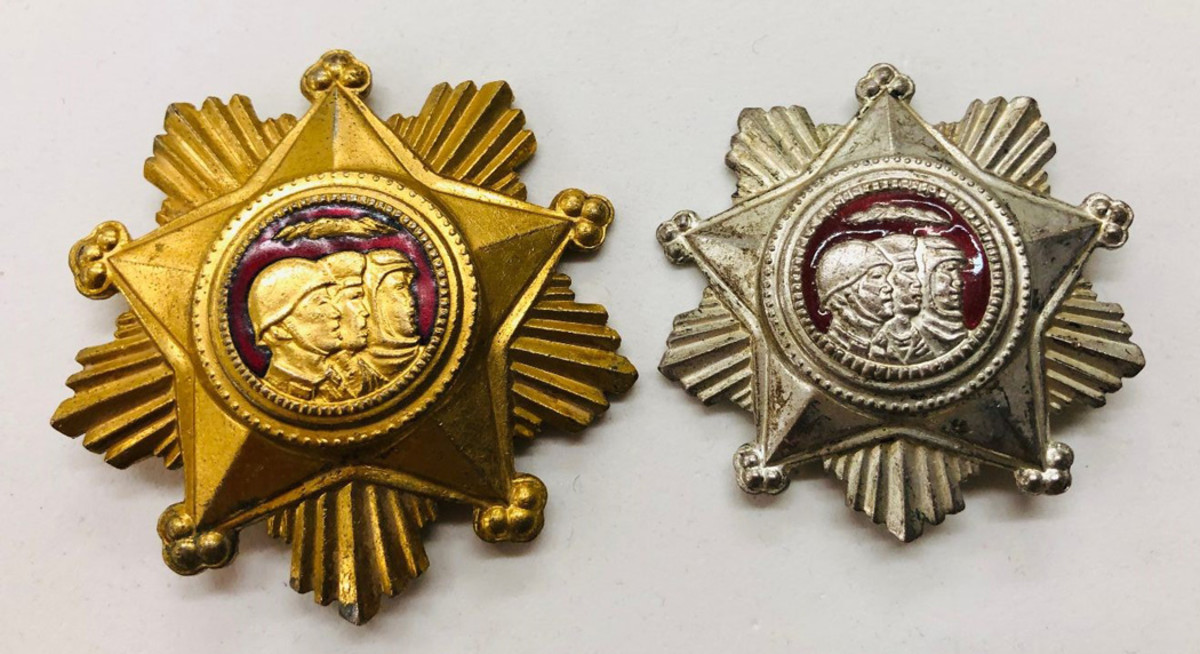 The Order of Military Service Honor returns to a more strictly military award. In all three classes the medal is a five-pointed pinback star.