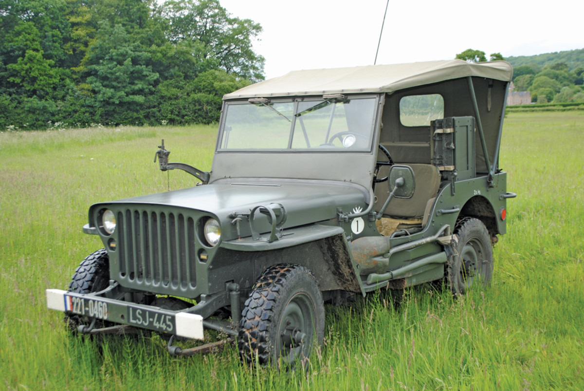 The Hoss M201 Jeep with canvas top erected to protect the driver and crew from the weather. It is carrying all the tools and ancillary equipment.