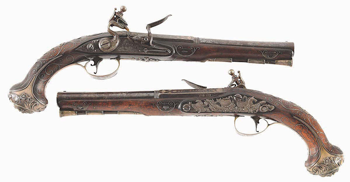 Stunning pair of Daniel Moore (London, master gunsmith active circa 1758-1800) presentation flintlock pistols with solid silver mounts by John King. Owned by Edward Lloyd IV, delegate to the Continental Congress who was known as ‘The Patriot.’