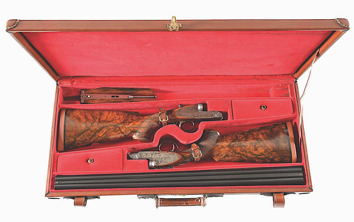 Pair of circa-1978 Ivo Fabbri (Italian) sidelock side-by-side 12-gauge shotguns, custom made with engraved mythological and fantasy scenes by Claudio Tomasoni. The duo has been featured twice on the cover of American Shotgunner magazine (April 1981, June 1986). Beautiful pair of game guns exhibiting the world’s highest standard of quality and design from a company that makes only around 30 firearms per year. Presented in fine two-gun leather luggage case.