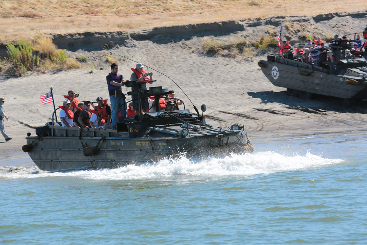 In recent years the mass media has maligned what they dubbed as “duck boats,” but the historical record shows that the extraordinarily well engineered GMC DUKW, in its wartime form, was well equipped for adverse water conditions. Here, Steve Greenberg guides his restored DUKW, laden with fellow historic military vehicle enthusiasts, into the Columbia River.