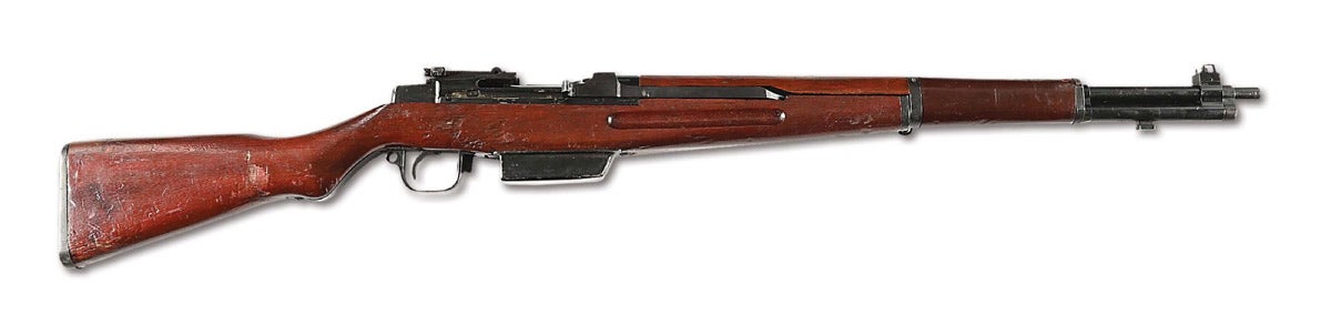 Very rare and desirable Japanese Type 5 Garand semi-automatic rifle Serial No. 13, a Japan-produced experimental adaptation of the American Garand. One of approximately 125 made at the midpoint of WWII, starting in 1944. Standard Japanese 7.7mm chambering. Documented with 1946 capture certificate, shipping box