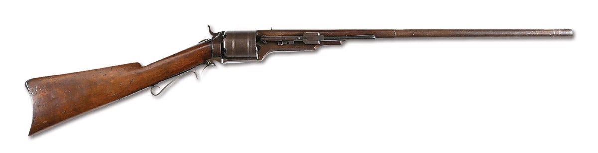 Very rare and fine Martial Colt Paterson Model 1839 percussion revolving rifle, .525 smoothbore, manufactured circa 1838-1841, one of 360 purchased by the US War Department from a total production run of only 950 guns. Cylinder roll-die-engraved by W.L. Ormsby. Matching serial numbers. Historical model with very low survival rate.