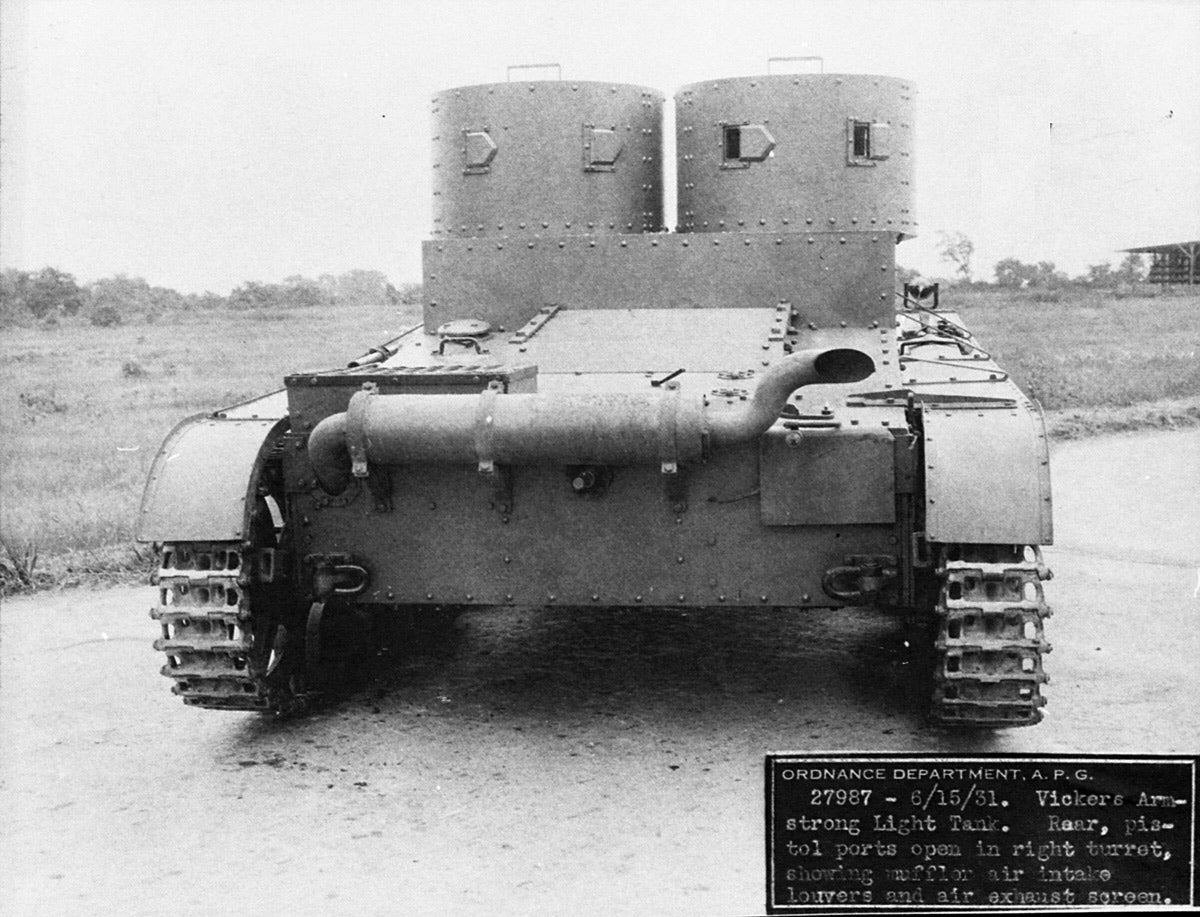 Another photo from the rear shows the pistol ports open in the right turret, muffler [exhaust silencer] air intake louvers and air exhaust system.