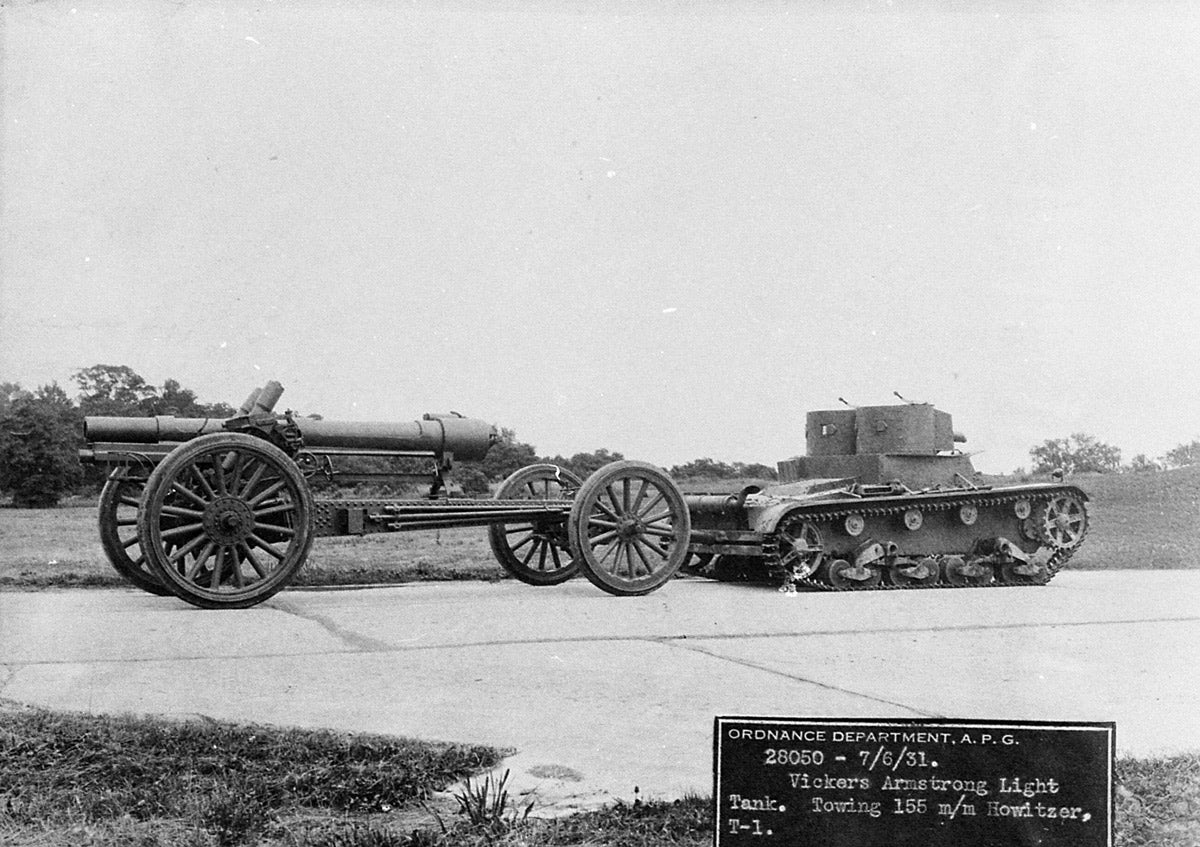 Towing the 155mm Howitzer T-1. Artillary-style wheels were still commonplace in the 1920s.