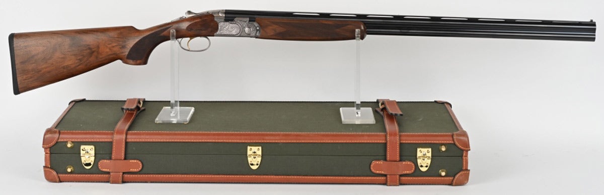 Beretta 687 Silver Pigeon II 20/28-gauge Combo Edition over/under shotgun manufactured in 2008. Blued finished barrels with white front and silver mid-beads. Receiver embossed and fully engraved with bird scenes, scroll-engraved on the bottom, with words ‘P. BERETTA SILVER PIGEON II J.E.G. SPECIAL’ (Joel Etchen Guns). Accompanied by custom hard case and 12 choke tubes. Sold for $5,520 against an estimate of $3,500-$4,500