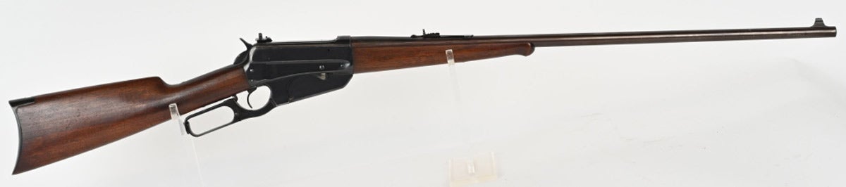 Winchester Model 1895 lever-action rifle manufactured in 1932, 303 British caliber. Blued finished steel with brass bead blade-type front sight and installed Lyman #21 rear sight. Top of barrel stamped ‘.303 BRITISH.’ Left side of barrel stamped ‘NICKEL STEEL BARREL FOR SMOKELESS POWDER.’ Two-line Winchester address stamped on left side of receiver. Sold for $4,680 against an estimate of $2,200-$3,000