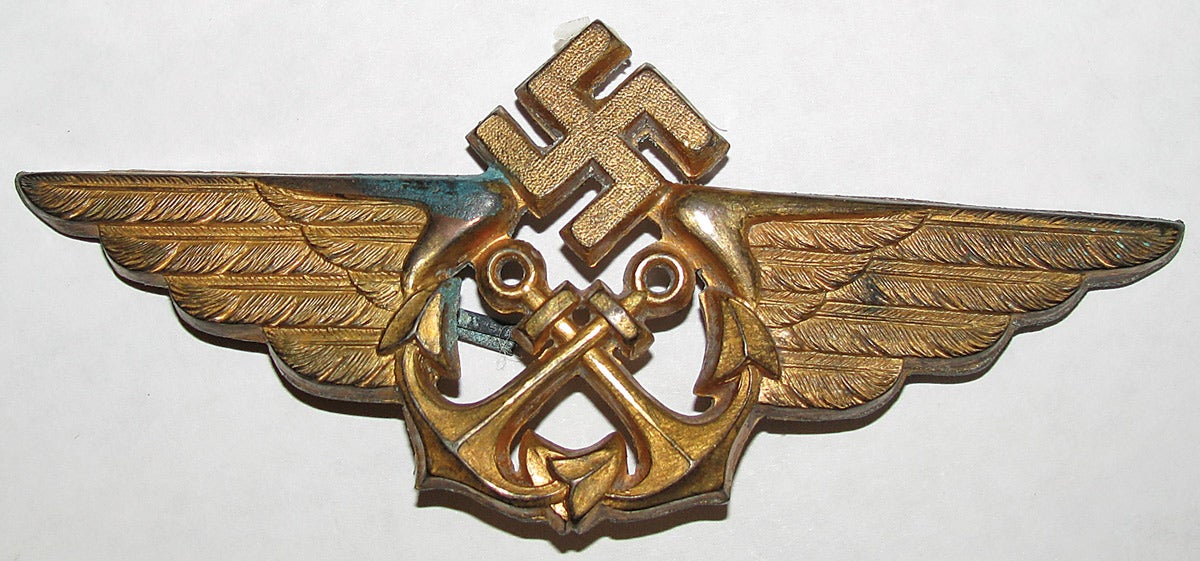 A cap device for the maritime air sea rescue service, originally a civilian organization that later flew coastline missions for military reasons.
