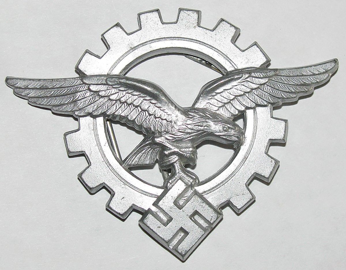 A “Generalluftzeugmeister” (GL- Chief Supply and Procurement Service) badge. These men acted as controllers of armament factories. Often referred to as an officer’s cap badge.