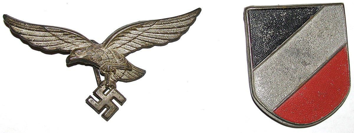 The eagle and shield devices that would be mounted on either side of a Luftwaffe pith helmet.
