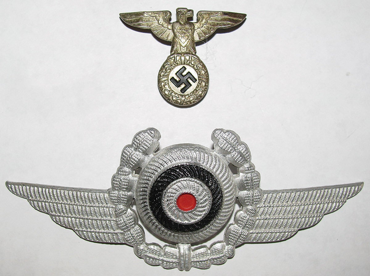 A DLV visor cap set for “Fliegerschaft” (flying troops) personnel.