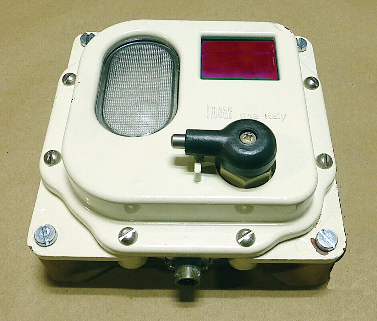 Other types of M-series lamps were of similar construction, such as this interior lamp with both clear and night vision red lenses and a switch that prevented the white light from being accidentally turned on. These lights were often fitted to tanks and armored vehicles.