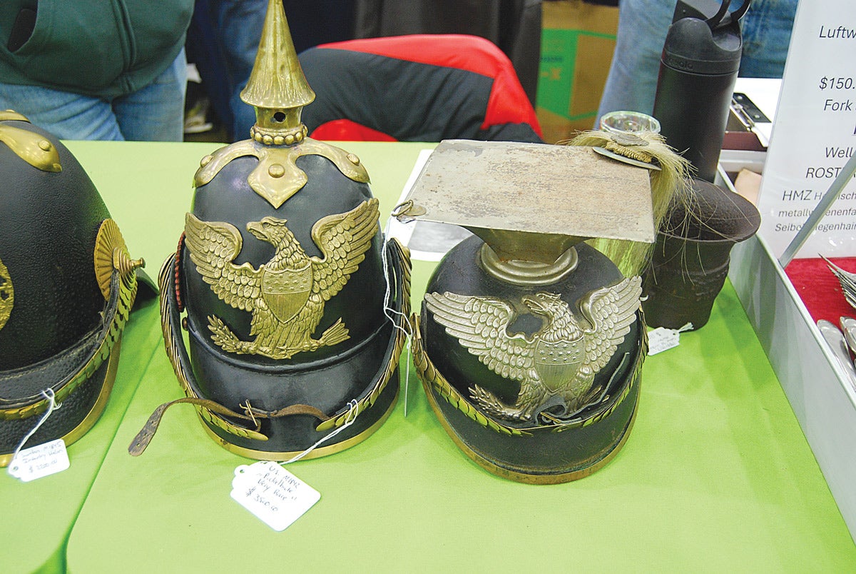 These aren’t German or Prussian – but rather American from the middle of the 19th century. The shapka on the right was used by an Ohio militia regiment, likely made of up German immigrants.