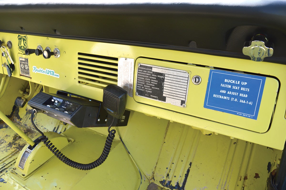 The data plate from the military remains on the glovebox, while the U.S. Forest Service data plate is to its left, on the instrument panel. The Forest Service had a CB mounted under the instrument panel, so Mayer found a replacement.